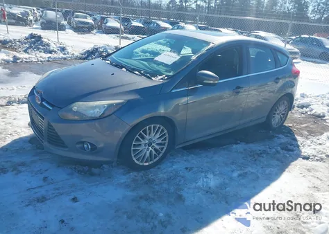 2014 Ford Focus Titanium z USA, uszkodzony, nr VIN 1FADP3N29EL458544